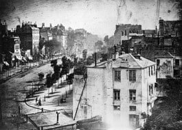 The Boulevard du Temple, Louis Daguerre's 1838 daguerreotype of a busy street, with only one man remaining in one place long enough to be clearly visible (near the bottom left corner).
